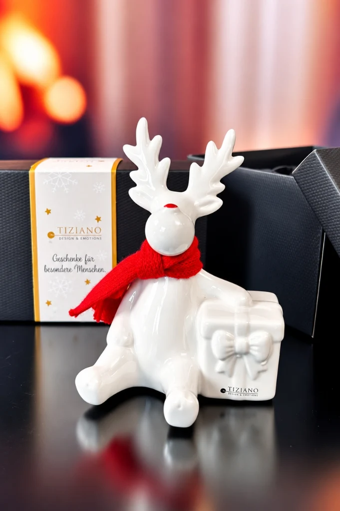 Deko Rentier Rudolph mit Geschenk im Geschenkkarton