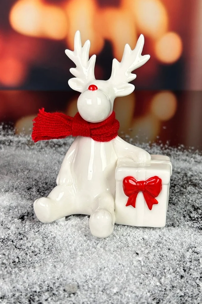 Deko Rentier Rudolph mit Geschenk rot im Geschenkkarton