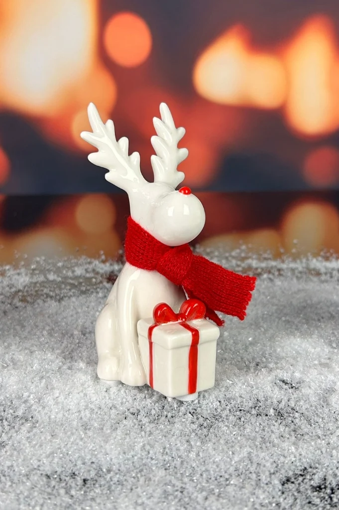 Deko Rentier Rudolph mit Geschenk rot im Geschenkkarton