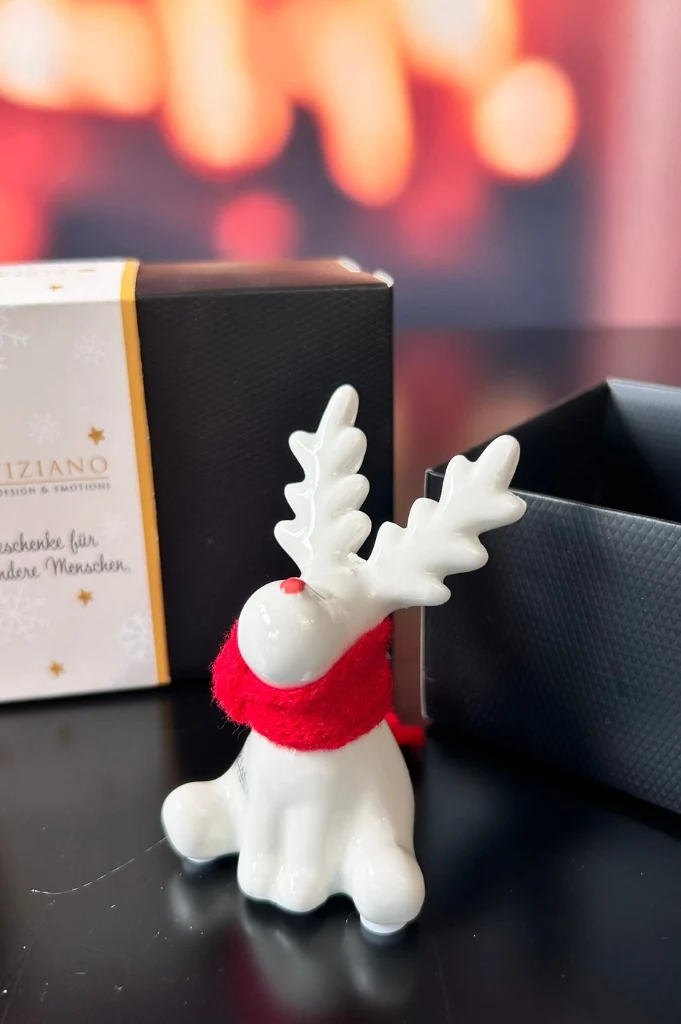 Deko Rentier Rudolph sitzend in Geschenkkarton