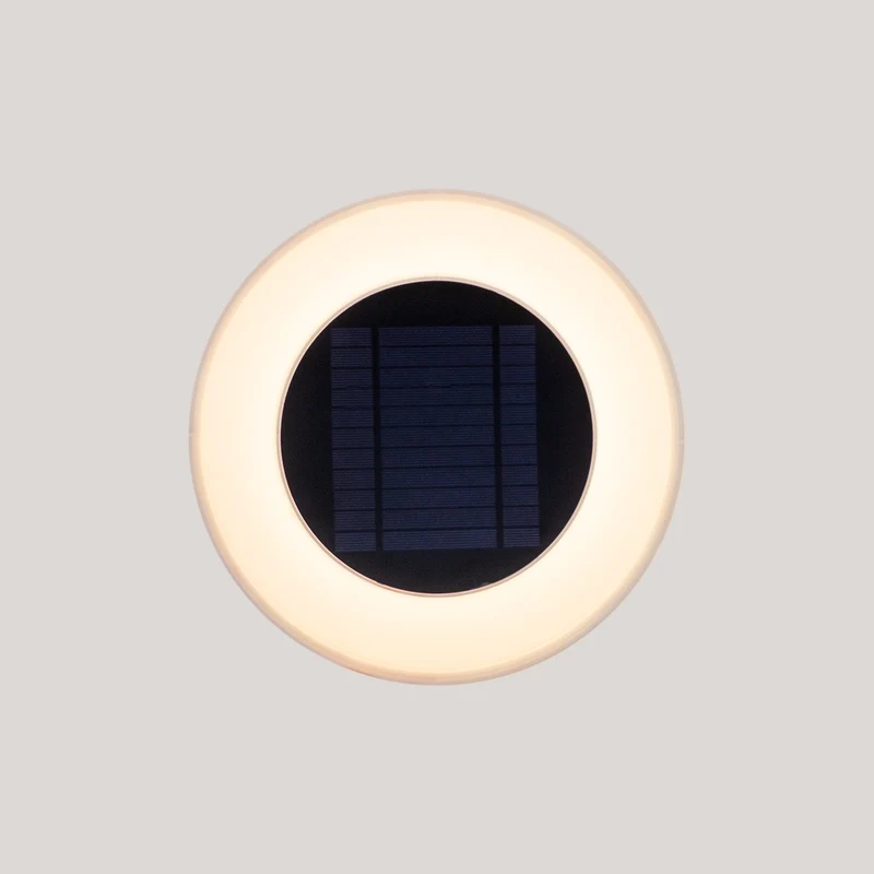 WALLY DISK runde Wandleuchte mit Solarladung